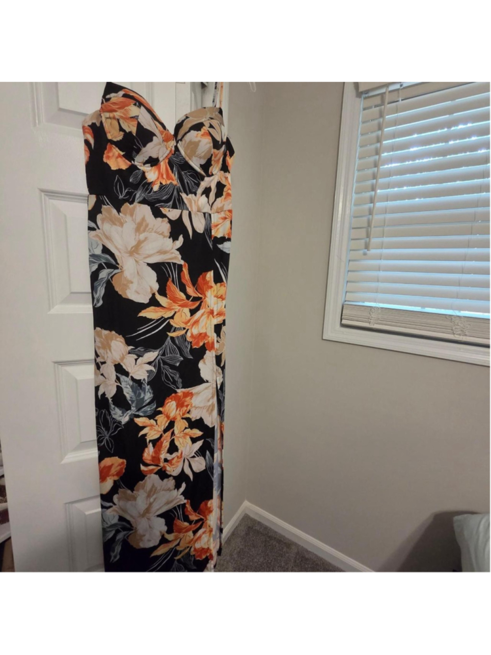 Orange and cream floral maxi dress with black background and high slit size larg